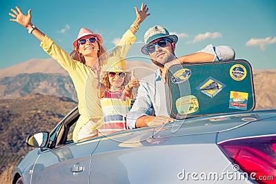 Happy family travel by car in the mountains Stock Photo