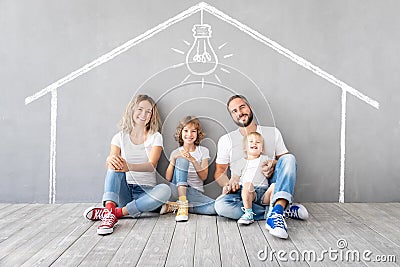 Happy family with two kids playing into new home Stock Photo