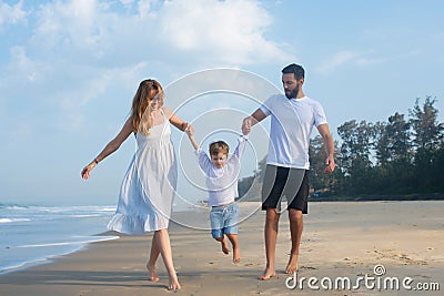 Happy family on vacation, mom, dad, son. baby on daddy`s shoulders Stock Photo