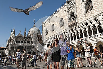 Happy family at San Marco in Venice, Italy Editorial Stock Photo