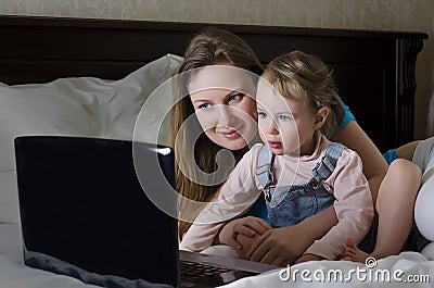 Happy family watching a cartoon Stock Photo