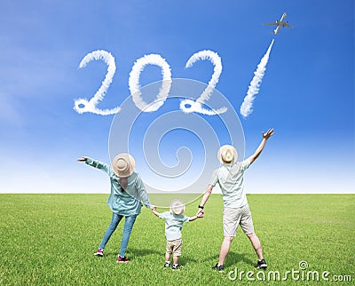 Happy family watching the sky and celebrating new year 2021 concepts Stock Photo