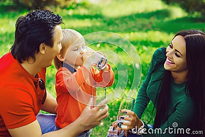 Happy family with water glass Stock Photo