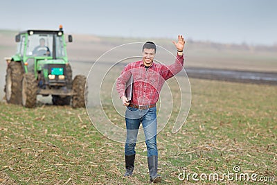 Happy farmer on field Stock Photo