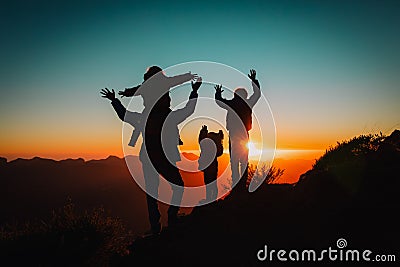 Happy father with kids travel in sunset mountains, family hiking in nature Stock Photo