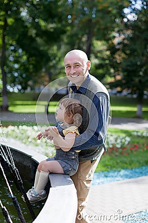 Happy father plays with 2 years baby Stock Photo