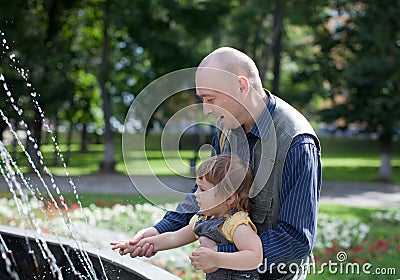 Happy father plays with child Stock Photo