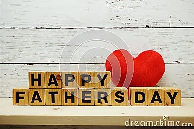 Happy Father`s Day concept with alphabet letters with red heart on space wooden background Stock Photo