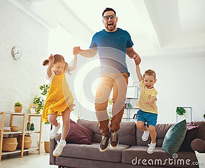 . Happy father`s day! Children congratulates dad a jump and dance Stock Photo