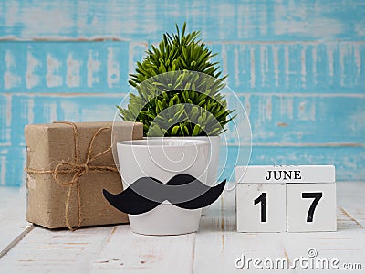 Happy father`s day concept. 17 June wooden block calendar, gift Stock Photo