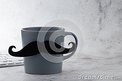 Happy father`s day! Cup of coffee and keyboard on table. Copy space Stock Photo