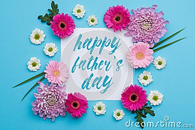 Happy Father`s day Pastel Candy Colours Background. Floral Father day flat lay. Stock Photo