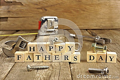 Happy Fathers Day blocks on rustic wood Stock Photo