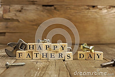 Happy Fathers Day blocks on rustic wood Stock Photo