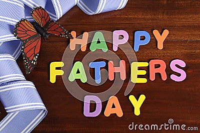 Happy Fathers Day childrens toy block colorful letters spelling greeting Stock Photo