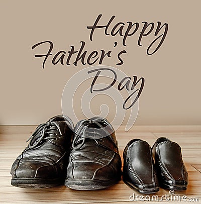 Happy fathers day, fathers shoes and baby boys shoes overhead, flat lay Stock Photo