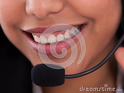 Happy Female Customer Representative Stock Photo