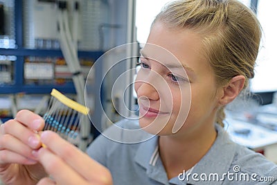 Happy female network technician Stock Photo