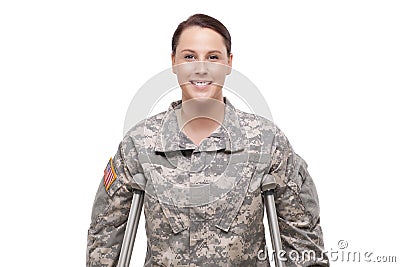 Happy female soldier with crutches Stock Photo