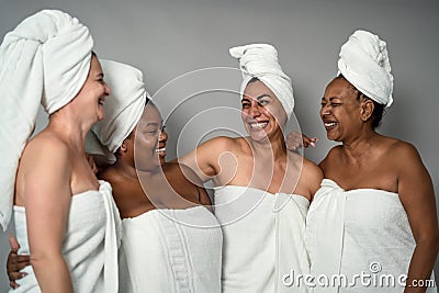 Happy females with different age and body size having skin care spa day Stock Photo