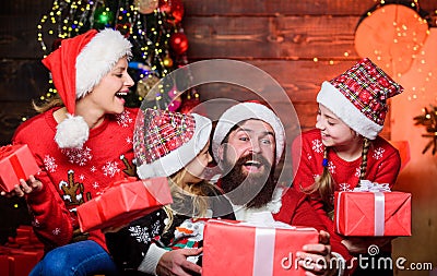 Happy festive season. Happy family celebrate new year and Christmas. Mother and daughters enjoy Christmas day. Father Stock Photo