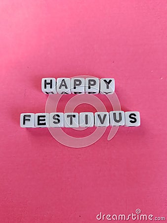 Happy festivus fictional holiday poster on a pink background Stock Photo