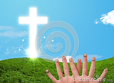 Happy finger smileys with christian religion cross Stock Photo