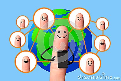 Happy finger using mobile phone with world map, Social network concept. Stock Photo