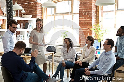 Happy friendly business team having fun at corporate training Stock Photo