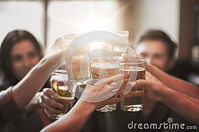 Happy friends drinking beer at bar or pub Stock Photo