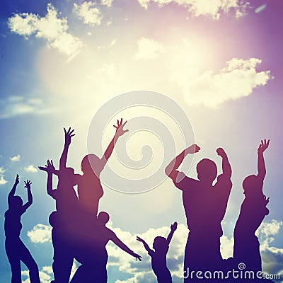 Happy friends, family jumping together having fun Stock Photo