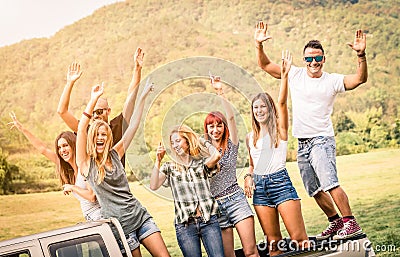 Happy friends having fun at off road party trip Stock Photo