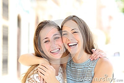 Happy friends with perfect smile looks at you Stock Photo