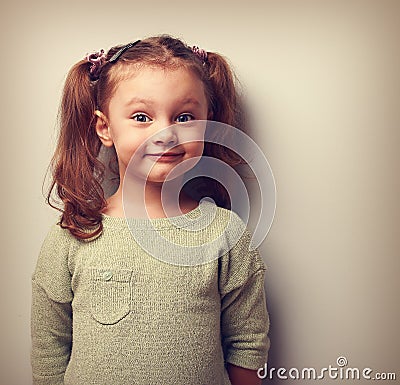 Happy fun girl looking with smile. Happiness in childhood Stock Photo