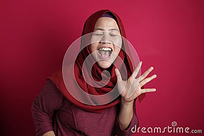 Happy Funny Asian Muslim Woman Dancing Full of Joy Stock Photo
