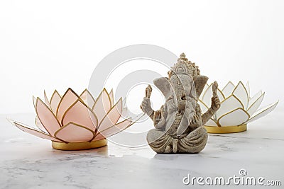 Happy Ganesh Chaturthi festival, Lord Ganesha statue with lotus on marble background, Stock Photo