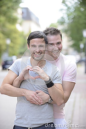 Happy gay couple outdoors Stock Photo