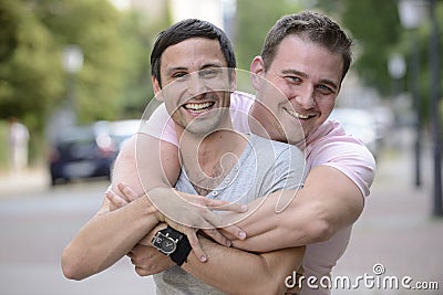 Happy gay couple outdoors Stock Photo