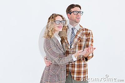 Happy geeky hipster couple holding their hands Stock Photo