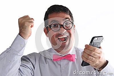 Happy Geeky man receives an exciting message or phone call Stock Photo