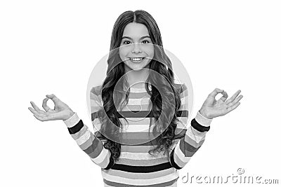 Happy girl child meditate using energizing yoga Gyan mudra isolated on white, meditation Stock Photo