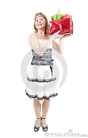 Happy girl with gifts isolated over white Stock Photo