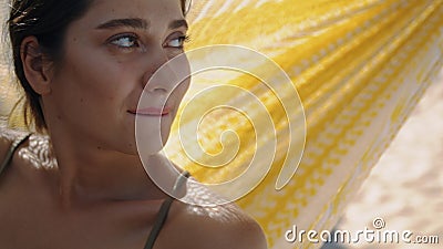 Happy girl hammock daydreaming in sunlight closeup. Carefree woman relaxing Stock Photo