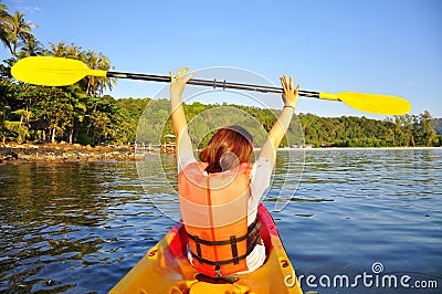 Happy girl having fun on kayak Stock Photo