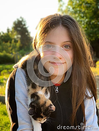 Happy girl and her kitty Stock Photo