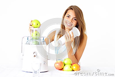 Happy girl about juicer Stock Photo