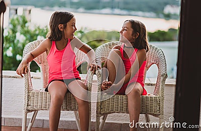 Happy girl kids enjoying summer vacation at sea resort Stock Photo