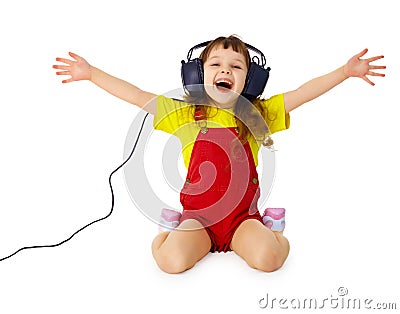 Happy girl listens to music with headphones Stock Photo