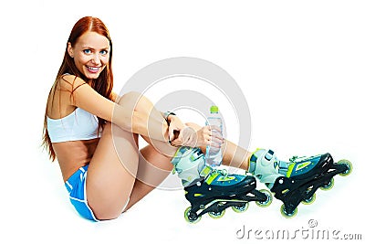 Happy girl with rollerskates Stock Photo