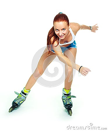 Happy girl with rollerskates Stock Photo